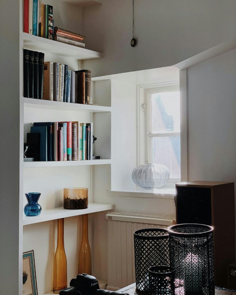 Narrow TV console with closed storage in small living room