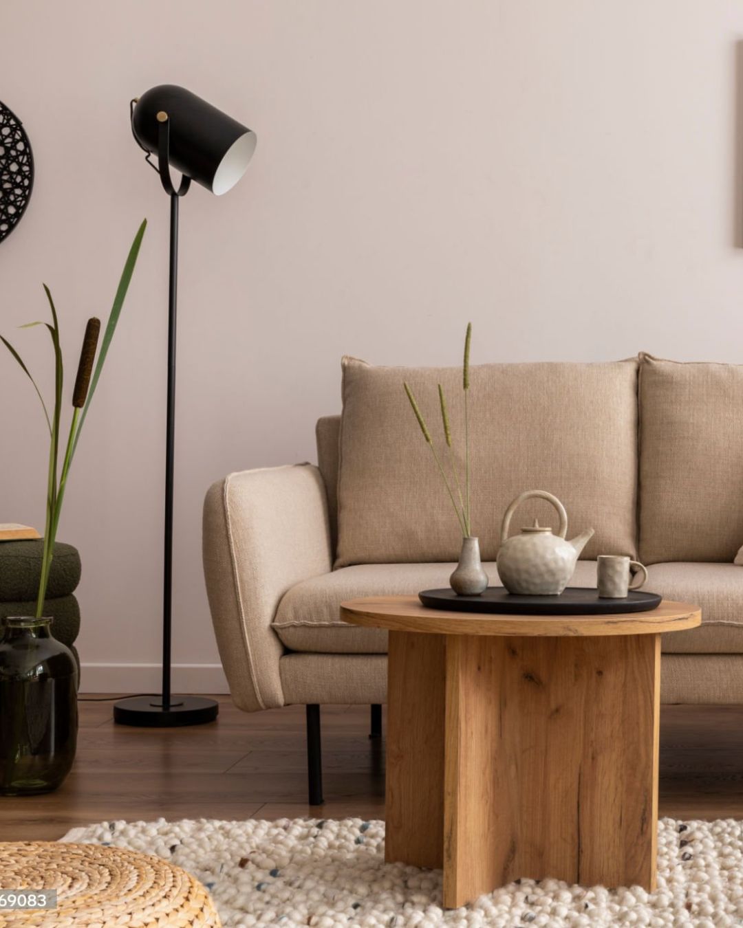 Small living room furniture arranged around sofa and coffee table
