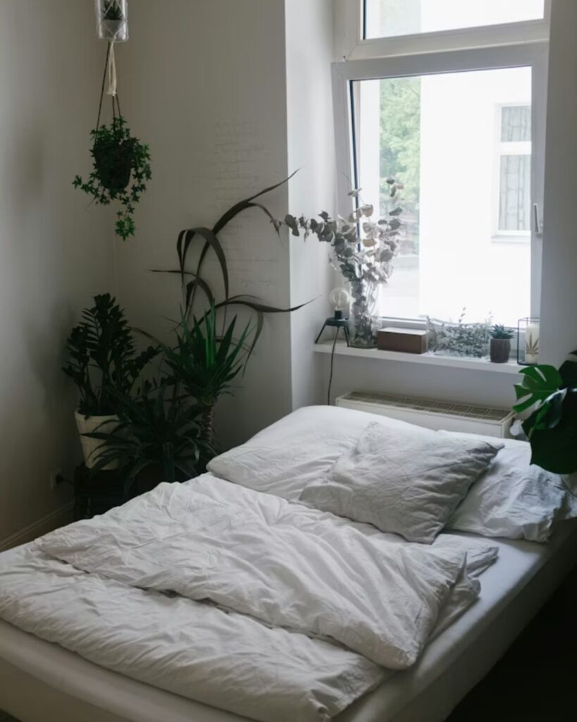 Cozy sleeping area in small studio apartment