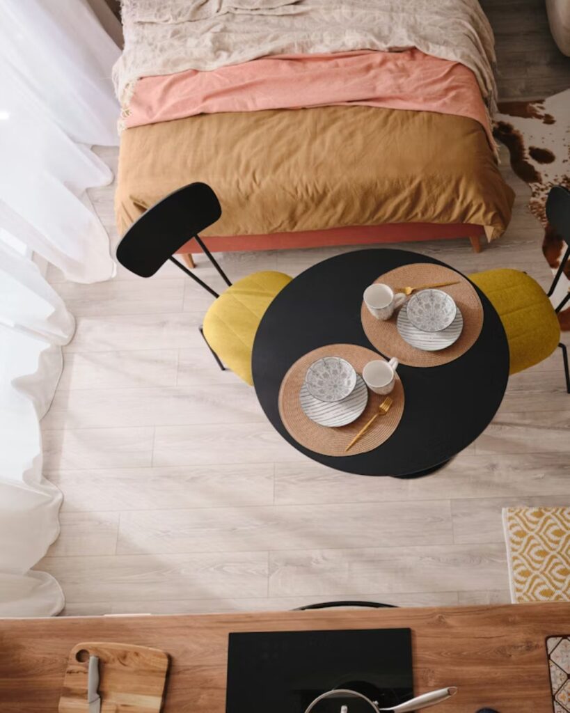 Compact dining area inside studio apartment